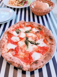 High angle view of pizza in plate on table