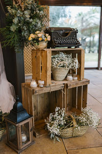 Potted plants in basket on table