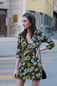 Young woman standing on street