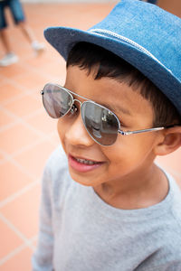 Close-up of boy wearing sunglasses