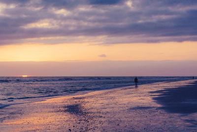 Scenic view of beach during sunset