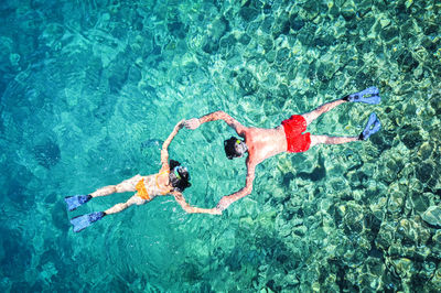 High angle view of man swimming in pool