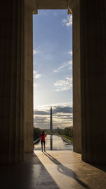 Man standing in colonnade