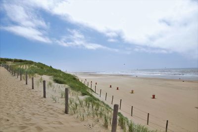 Scenic view of beach against sky