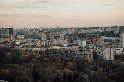 High angle view of buildings against sky during sunset