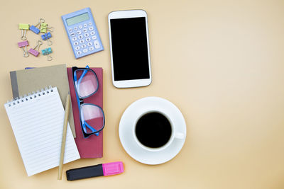 Directly above shot of coffee cup on table