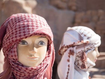 Close-up of hat wearing mask