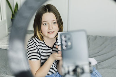 Make up influencer vlogging at home