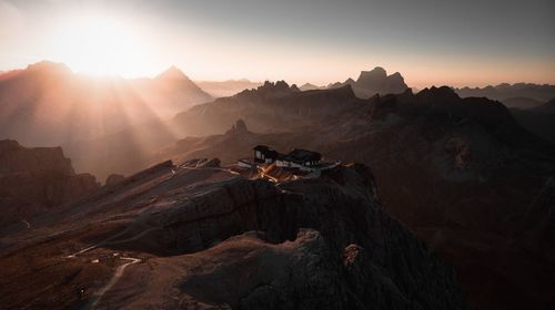 Scenic view of mountains against sky during sunset