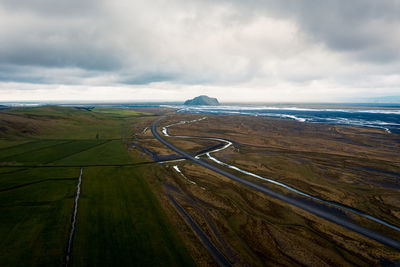 Aerial drone view of scenic road near seljalandsfoss waterfall, rangárþing eystra, southern iceland