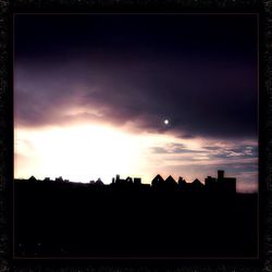 Silhouette of buildings at sunset