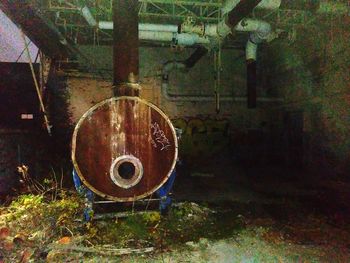 Old rusty wheel in abandoned building