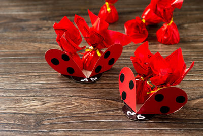 High angle view of red heart shape on table