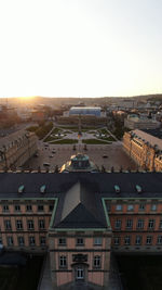 High angle view of buildings in town against clear sky