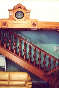 Low angle view of clock on balcony