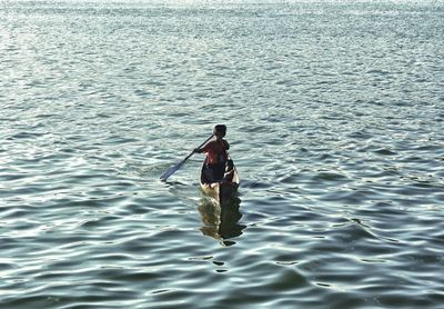 Reflection of people in water