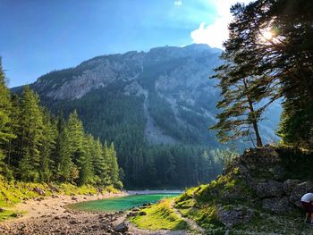 Scenic view of landscape and mountains against sky