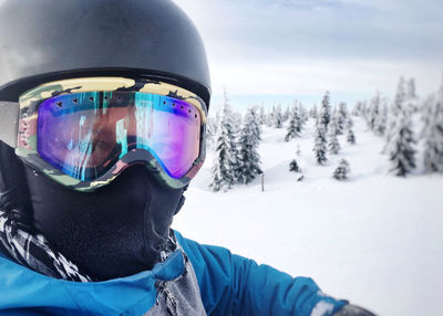Portrait of man in snow
