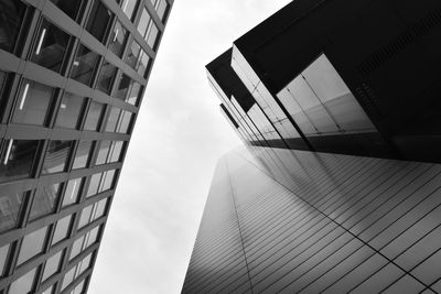Low angle view of modern buildings against sky