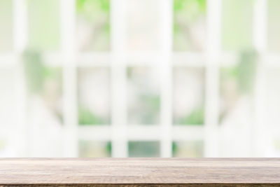 Close-up of window on wooden table