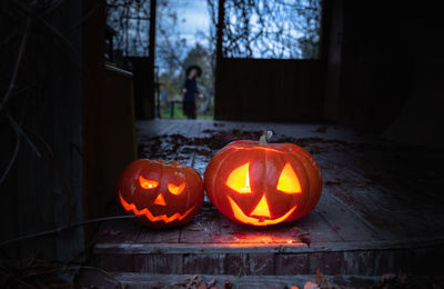 Illuminated pumpkin at night