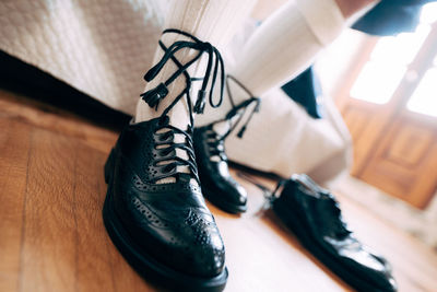 High angle view of black shoes on table