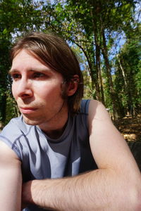 Portrait of young man looking away