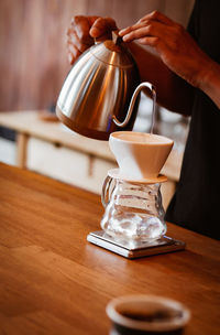 Close-up of coffee cup on table