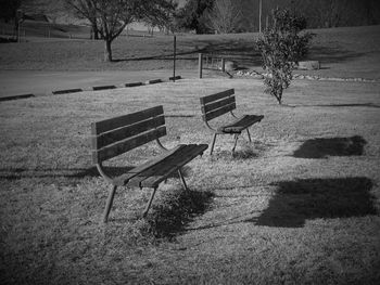 Empty benches in the dark