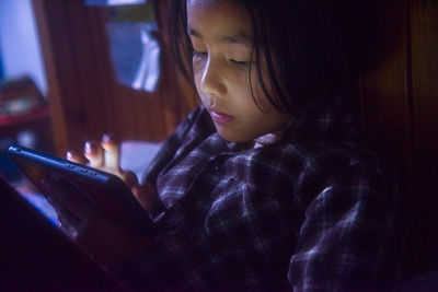 Young woman using mobile phone