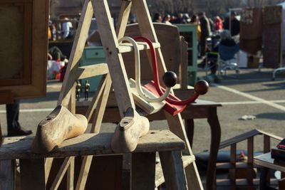 Close-up of chairs on table