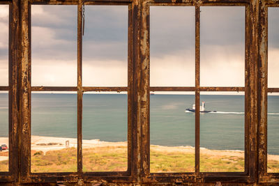 Sea seen through window