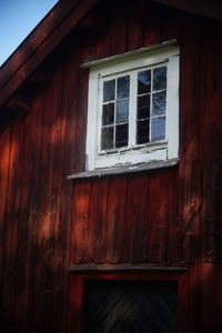 Low angle view of window of old building