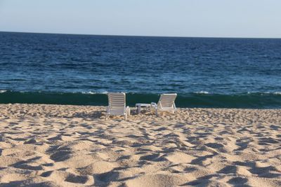 Scenic view of beach against clear sky