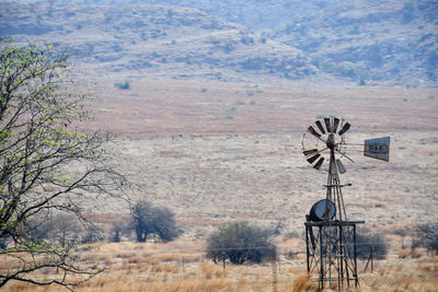 Scenic view of field against mountain