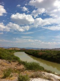 Scenic view of river against sky