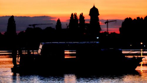 Silhouette of building during sunset