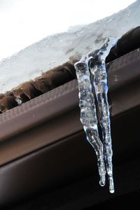 Close-up of snow against sky