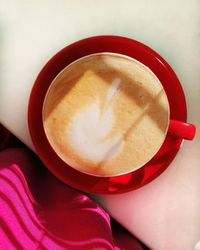 High angle view of cappuccino on table