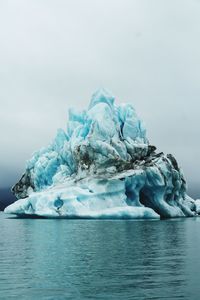 Scenic view of frozen sea against sky