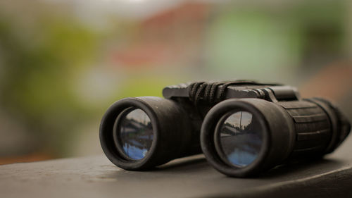 Close-up of camera on table