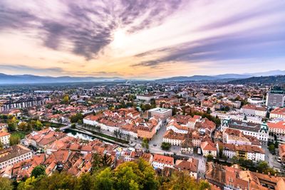High angle view of townscape against sky at sunset