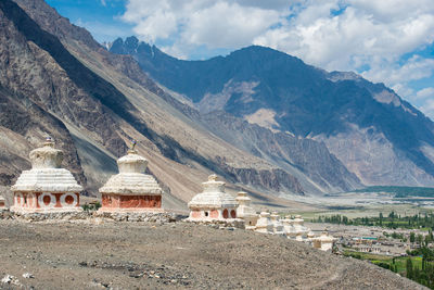 Scenic view of mountain against cloudy sky