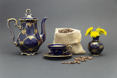 Close-up of various flowers in vase on table