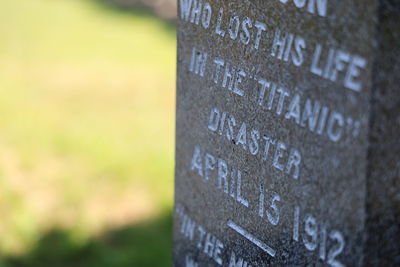 Close-up of text on wall