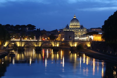 Reflection of illuminated buildings in water