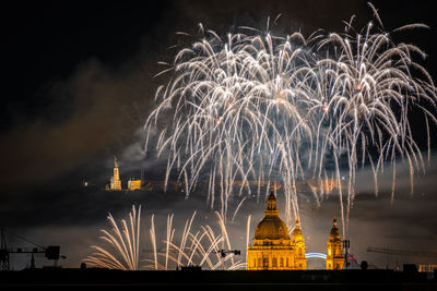 Firework display at night