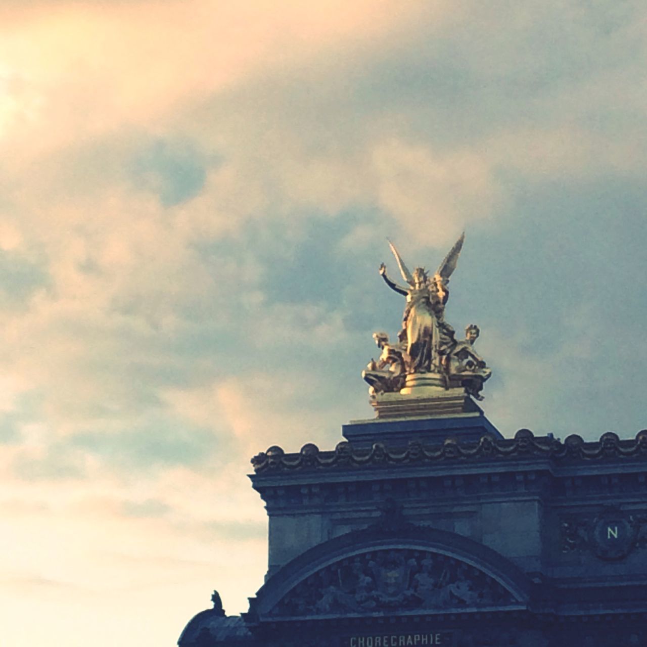 statue, sculpture, human representation, art and craft, art, low angle view, sky, creativity, cloud - sky, architecture, animal representation, built structure, famous place, travel destinations, history, cloudy, international landmark, cloud