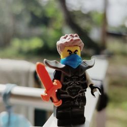 Close-up of stuffed toy on metal