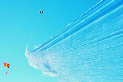 Parachute in sky